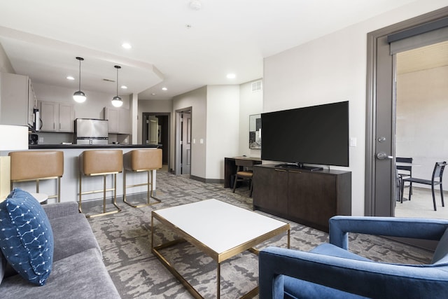 2513A Branson Landing Blvd, Branson, MO 65616 - living area with light carpet, recessed lighting, and baseboards