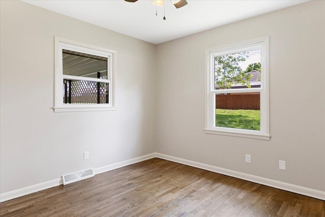 3156 N National Ave, Springfield, MO 65803 - unfurnished room with ceiling fan, wood finished floors, and baseboards