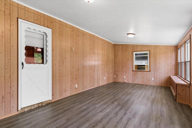3156 N National Ave, Springfield, MO 65803 - spare room with dark wood-style flooring, wooden walls, and baseboards