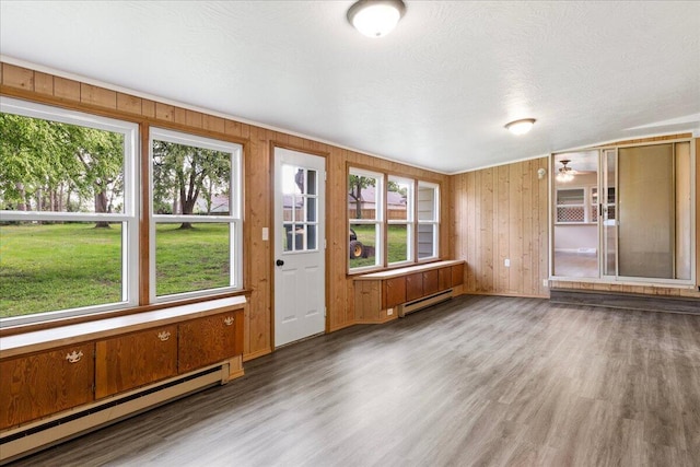 3156 N National Ave, Springfield, MO 65803 - unfurnished sunroom with a baseboard radiator, baseboard heating, and plenty of natural light