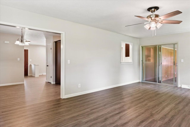 3156 N National Ave, Springfield, MO 65803 - unfurnished living room featuring a chandelier, wood finished floors, baseboards, and ceiling fan
