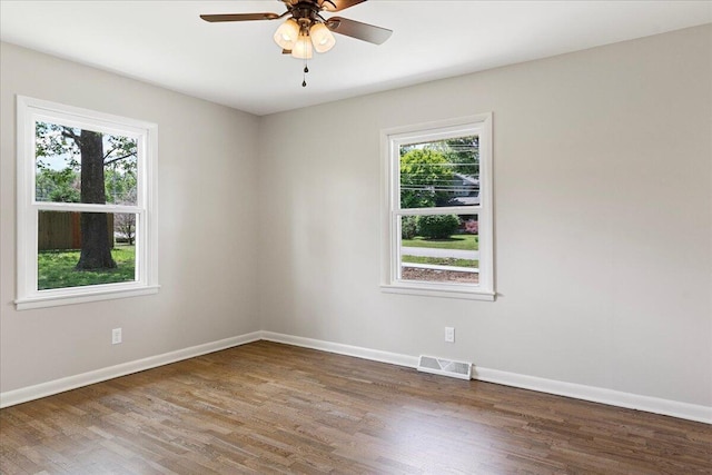 3156 N National Ave, Springfield, MO 65803 - spare room with wood finished floors and baseboards