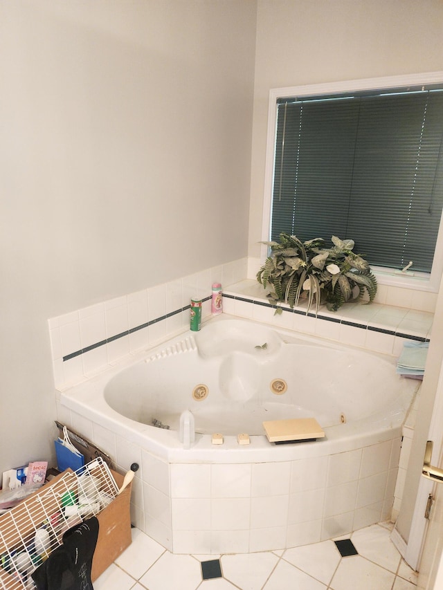 2016 Timberlake Rd, Branson, MO 65616 - bathroom with a tub with jets and tile patterned floors