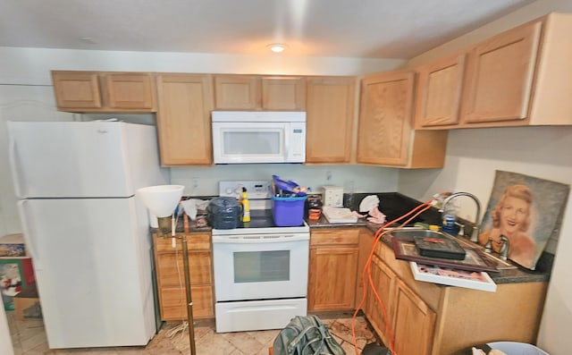 2016 Timberlake Rd, Branson, MO 65616 - kitchen featuring white appliances and dark countertops
