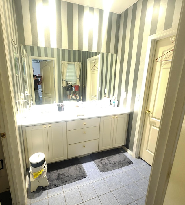 2016 Timberlake Rd, Branson, MO 65616 - bathroom featuring wallpapered walls, tile patterned flooring, and vanity