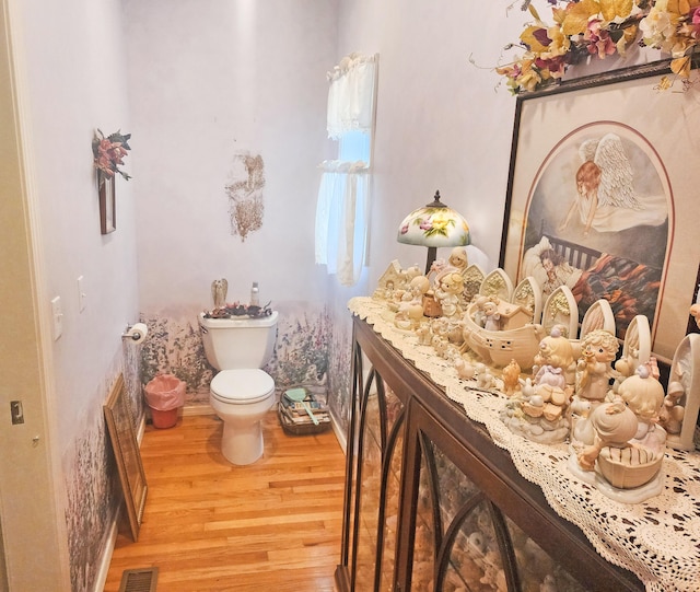 2016 Timberlake Rd, Branson, MO 65616 - bathroom featuring wood finished floors and toilet