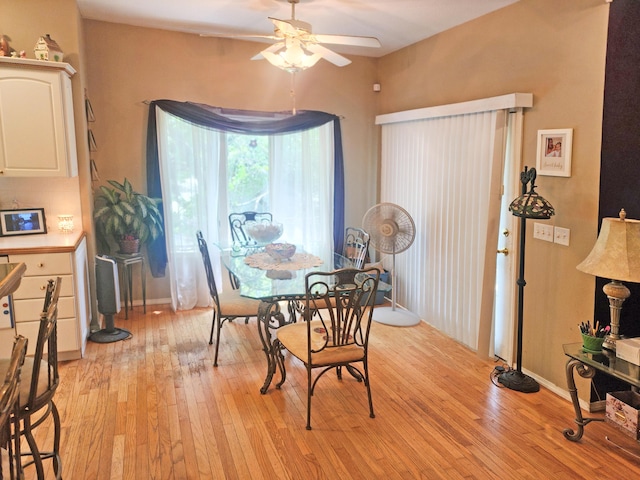 2016 Timberlake Rd, Branson, MO 65616 - dining space with ceiling fan, light wood finished floors, and baseboards