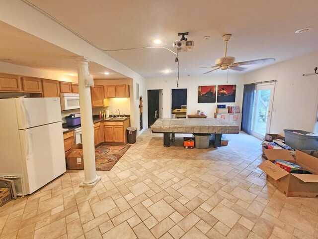 2016 Timberlake Rd, Branson, MO 65616 - kitchen featuring white appliances, open floor plan, decorative columns, recessed lighting, and a ceiling fan