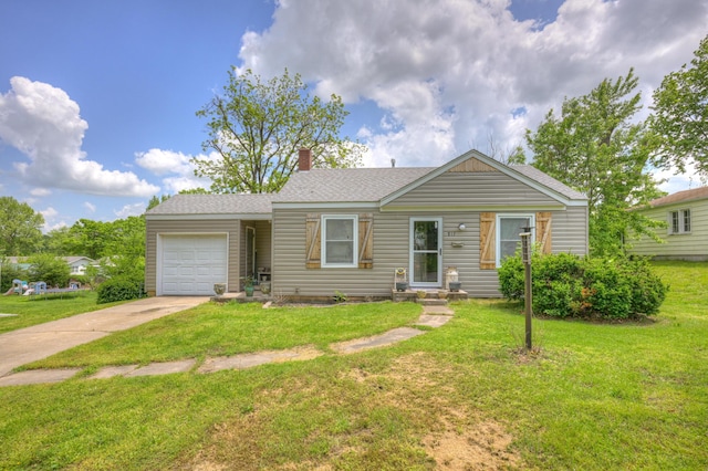 817 Kentland Dr, Neosho, MO 64850 - view of front of house with a garage, concrete driveway, and a front lawn