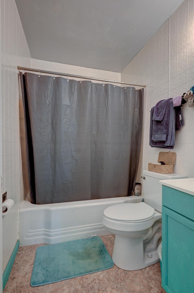 817 Kentland Dr, Neosho, MO 64850 - full bathroom with shower / bath combination with curtain, toilet, vanity, tile walls, and tile patterned flooring