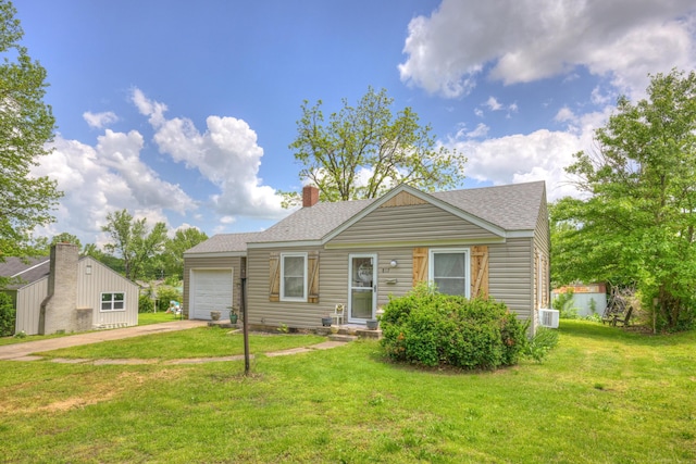 817 Kentland Dr, Neosho, MO 64850 - view of front facade with driveway, a garage, a shingled roof, a front lawn, and a chimney