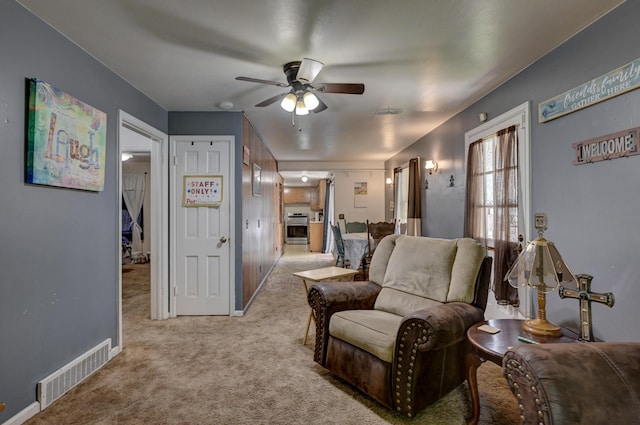 720 Kentland Dr, Neosho, MO 64850 - living area with carpet floors and ceiling fan