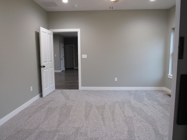 748 Birdsong Ln, Marshfield, MO 65706 - spare room with carpet, baseboards, and a smoke detector