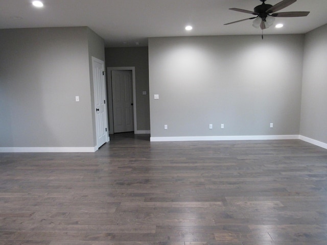 748 Birdsong Ln, Marshfield, MO 65706 - spare room featuring a ceiling fan, recessed lighting, dark wood-style flooring, and baseboards