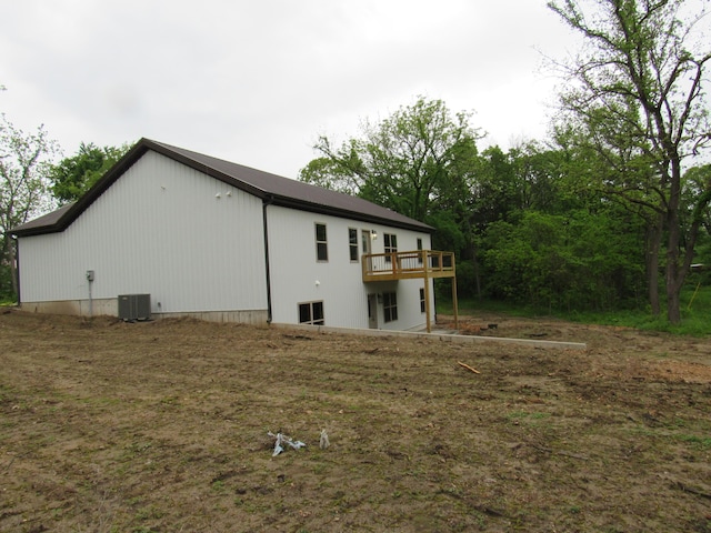 748 Birdsong Ln, Marshfield, MO 65706 - view of side of property featuring a wooden deck and central air condition unit