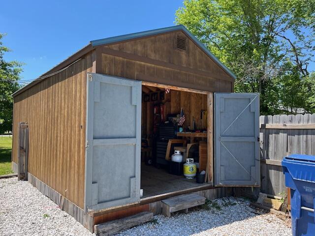 420 Maple St, Granby, MO 64844 - view of outdoor structure with fence and an outdoor structure