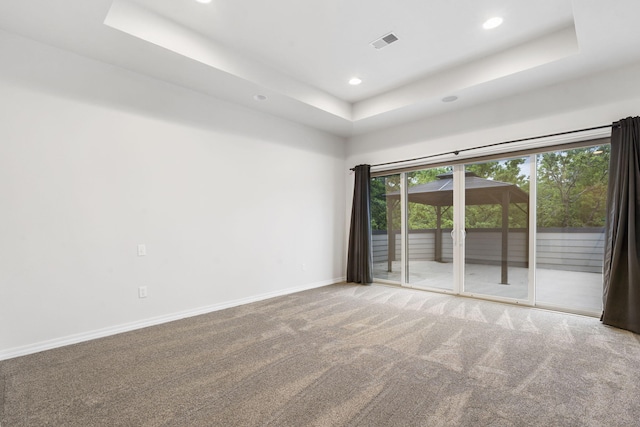 1970 Pointe Royale Dr, Branson, MO 65616 - carpeted spare room featuring a raised ceiling, recessed lighting, and baseboards