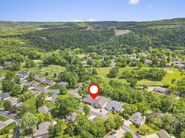 1970 Pointe Royale Dr, Branson, MO 65616 - aerial perspective of suburban area with a heavily wooded area and a local golf course