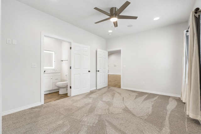 1970 Pointe Royale Dr, Branson, MO 65616 - unfurnished bedroom featuring carpet floors, baseboards, recessed lighting, connected bathroom, and ceiling fan