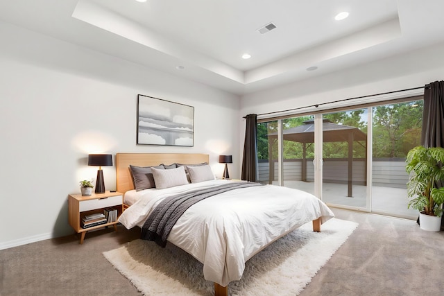 1970 Pointe Royale Dr, Branson, MO 65616 - carpeted bedroom featuring access to outside, a tray ceiling, recessed lighting, and baseboards