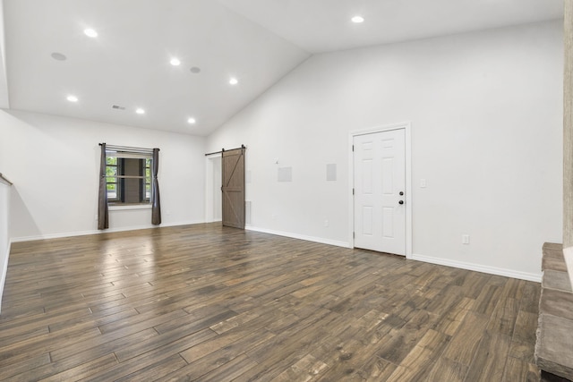1970 Pointe Royale Dr, Branson, MO 65616 - spare room with a barn door, dark wood-style floors, high vaulted ceiling, recessed lighting, and baseboards