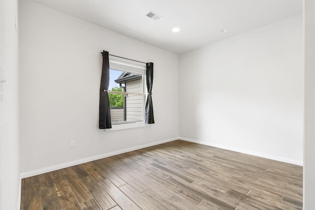 1970 Pointe Royale Dr, Branson, MO 65616 - unfurnished room with wood finished floors, baseboards, and recessed lighting