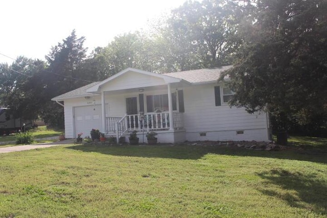 23197 Oakwood Cir, Hermitage, MO 65668 - single story home with crawl space, covered porch, a front lawn, a garage, and driveway