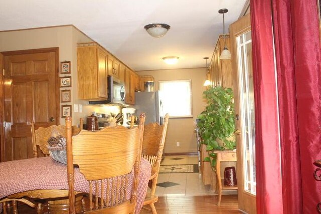 23197 Oakwood Cir, Hermitage, MO 65668 - dining area featuring wood finished floors