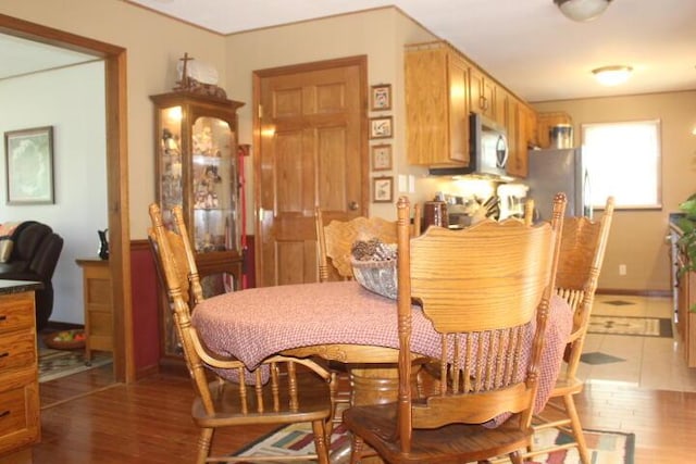 23197 Oakwood Cir, Hermitage, MO 65668 - dining room with wood finished floors