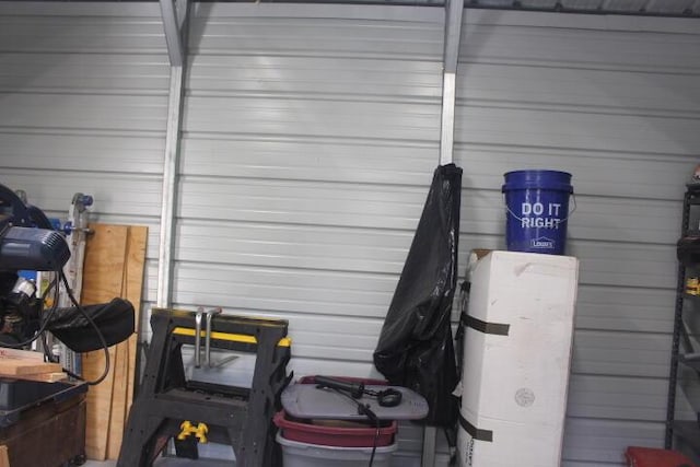 23197 Oakwood Cir, Hermitage, MO 65668 - garage featuring wooden walls