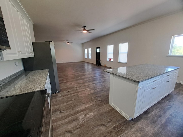 137 Vista Ln, Granby, MO 64844 - kitchen with range with electric stovetop, dark wood-style flooring, a ceiling fan, and healthy amount of natural light