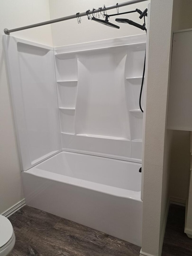 137 Vista Ln, Granby, MO 64844 - full bathroom with wood finished floors, shower / washtub combination, toilet, and baseboards