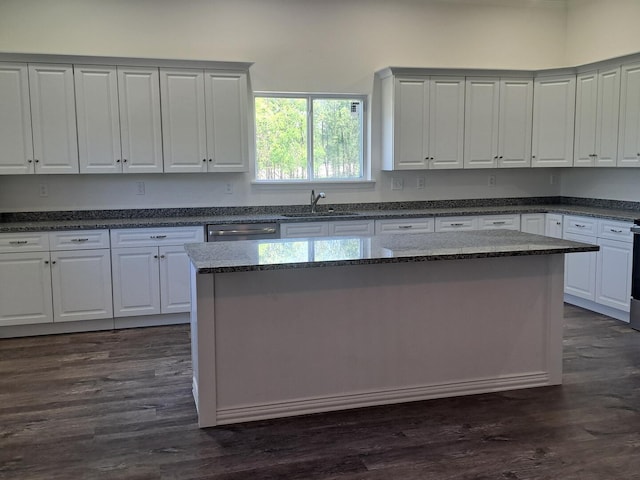 137 Vista Ln, Granby, MO 64844 - kitchen featuring dishwasher, white cabinets, and a kitchen island
