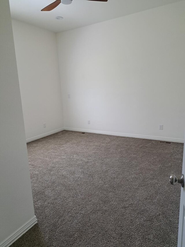 137 Vista Ln, Granby, MO 64844 - carpeted spare room with ceiling fan and baseboards