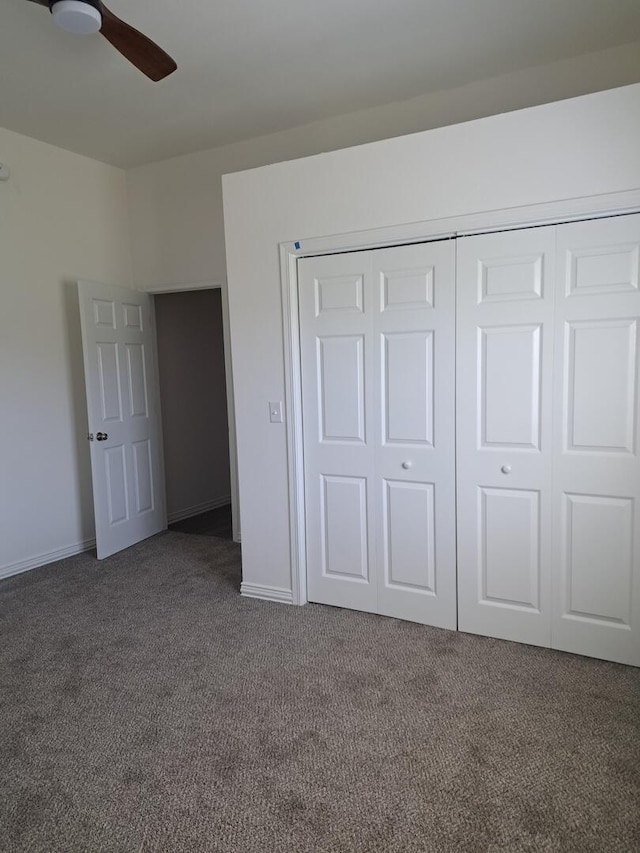 137 Vista Ln, Granby, MO 64844 - unfurnished bedroom with carpet, a closet, baseboards, and ceiling fan