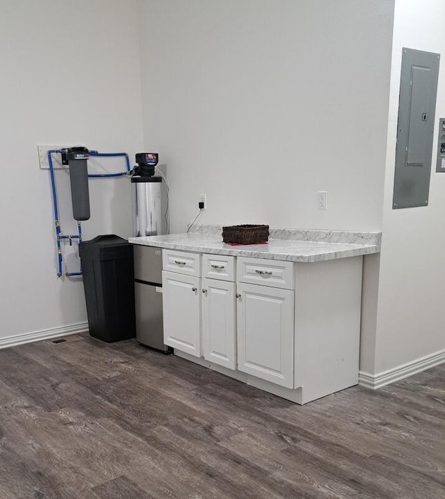 137 Vista Ln, Granby, MO 64844 - kitchen featuring electric panel, dark wood-type flooring, white cabinets, and light countertops