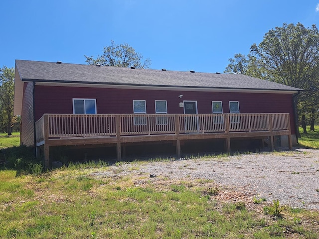 137 Vista Ln, Granby, MO 64844 - back of property featuring a deck and roof with shingles