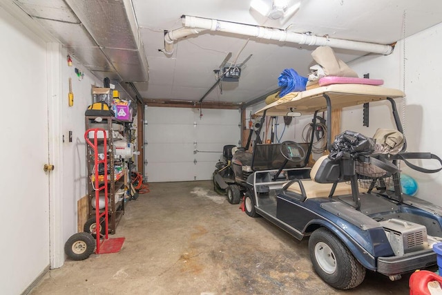 garage featuring a garage door opener