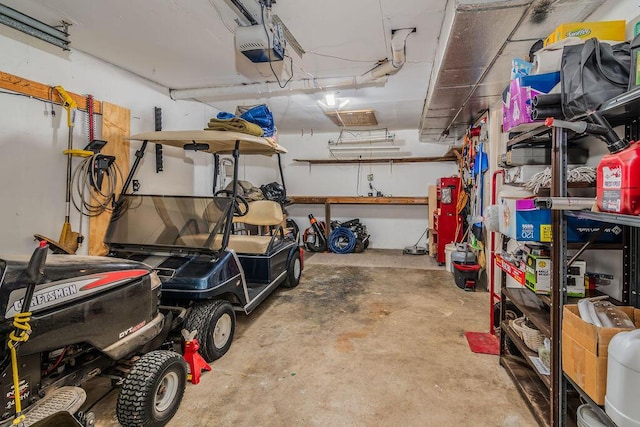 garage featuring a garage door opener