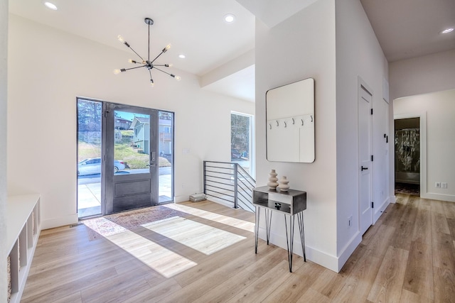 139 Cherokee Dr, Kimberling City, MO 65686 - entrance foyer with a chandelier, light wood-type flooring, baseboards, and recessed lighting