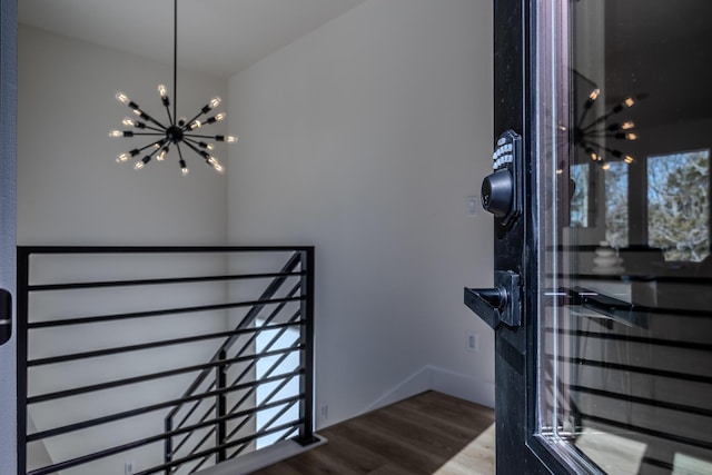 139 Cherokee Dr, Kimberling City, MO 65686 - entrance foyer with a chandelier and wood finished floors