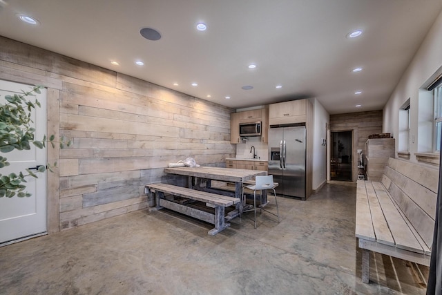 139 Cherokee Dr, Kimberling City, MO 65686 - dining area featuring recessed lighting, finished concrete floors, and wooden walls