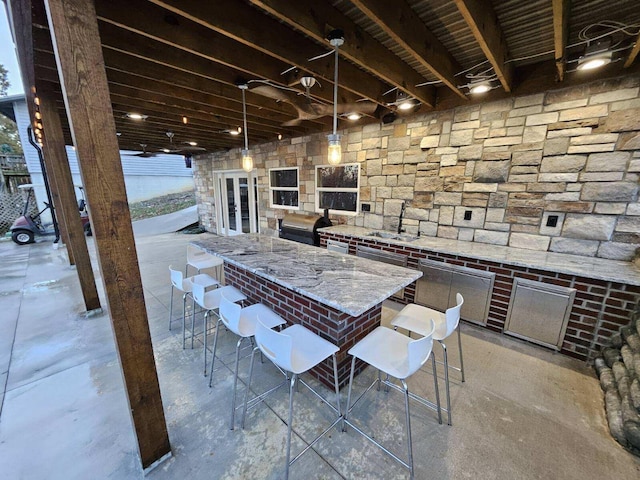 139 Cherokee Dr, Kimberling City, MO 65686 - view of patio / terrace featuring an outdoor kitchen and french doors