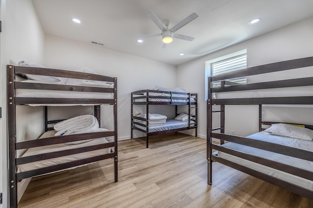139 Cherokee Dr, Kimberling City, MO 65686 - bedroom with wood finished floors, baseboards, recessed lighting, and ceiling fan