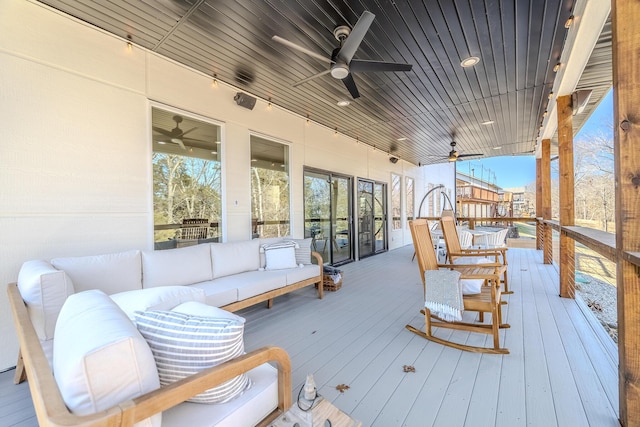 139 Cherokee Dr, Kimberling City, MO 65686 - wooden deck featuring a ceiling fan and an outdoor hangout area