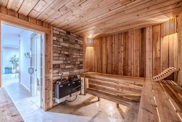 139 Cherokee Dr, Kimberling City, MO 65686 - relaxing sauna / steam room with wooden ceiling, concrete floors, and wood walls