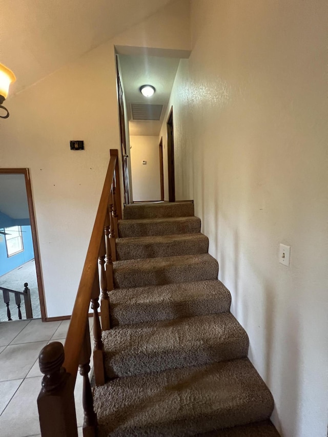 9556 N State Highway H, Pleasant Hope, MO 65725 - stairway featuring vaulted ceiling and tile patterned floors
