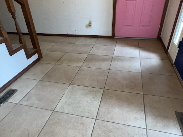 9556 N State Highway H, Pleasant Hope, MO 65725 - entryway featuring baseboards, stairway, and light tile patterned floors