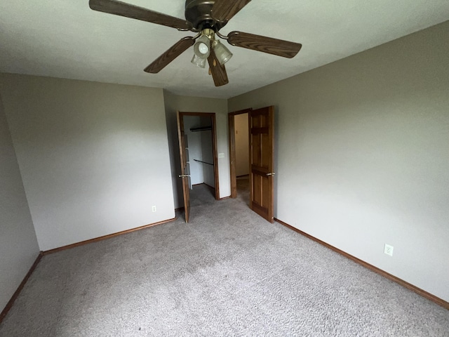 9556 N State Highway H, Pleasant Hope, MO 65725 - spare room featuring light colored carpet, a ceiling fan, and baseboards
