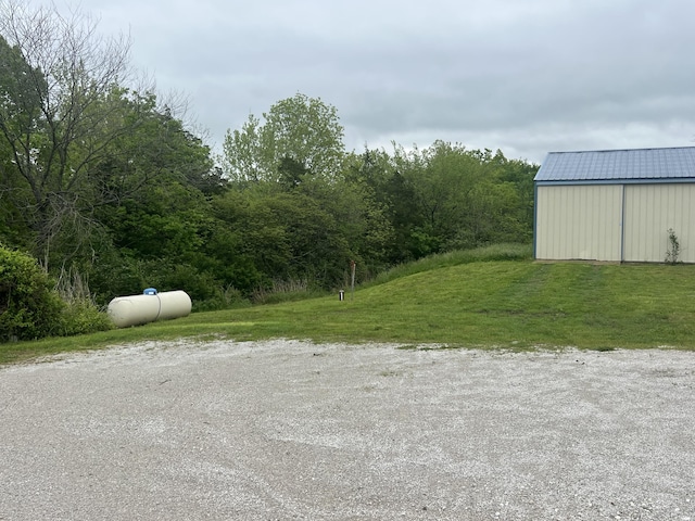9556 N State Highway H, Pleasant Hope, MO 65725 - view of street with an outbuilding